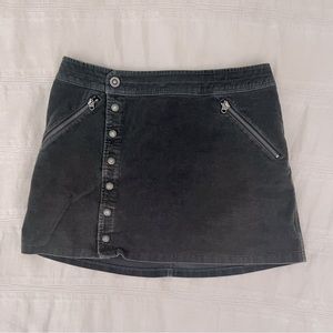 Kuhl grey corduroy mini skirt with snaps. Size 6.